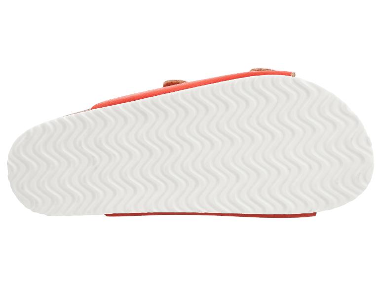 Sandaalzool met een golvend patroon in wit en een oranje rand.