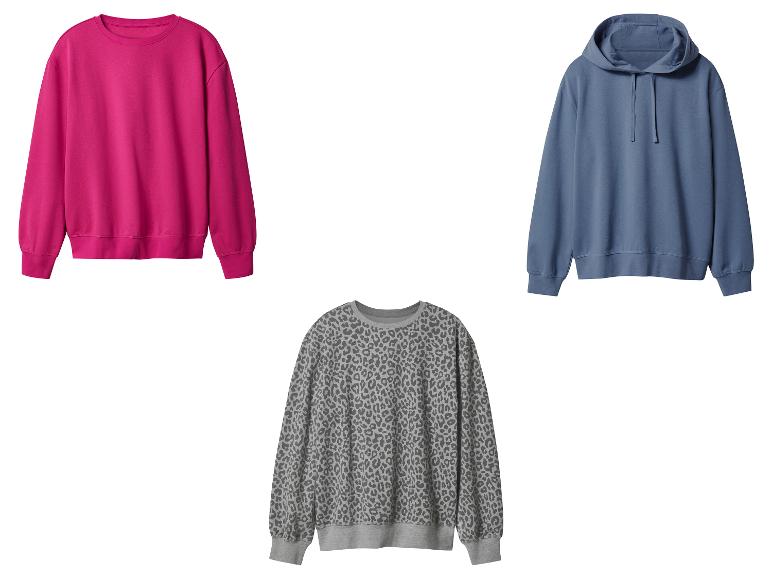 Drie sweatshirts: één fuchsia, één blauw en één grijs met luipaardprint.