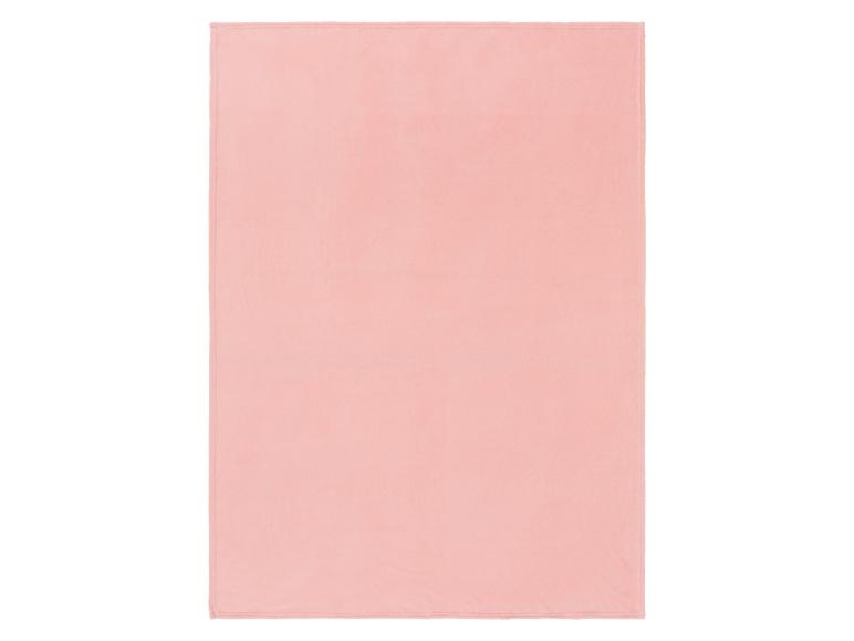 Zachtroze fleece deken.