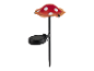 Solar lamp in de vorm van een rode paddenstoel met witte stippen.