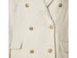 Een wit jasje van tweed met gouden knopen.