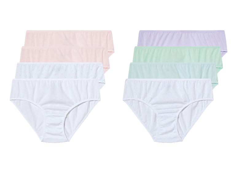 Twee sets ondergoed met witte, roze en groene slips.