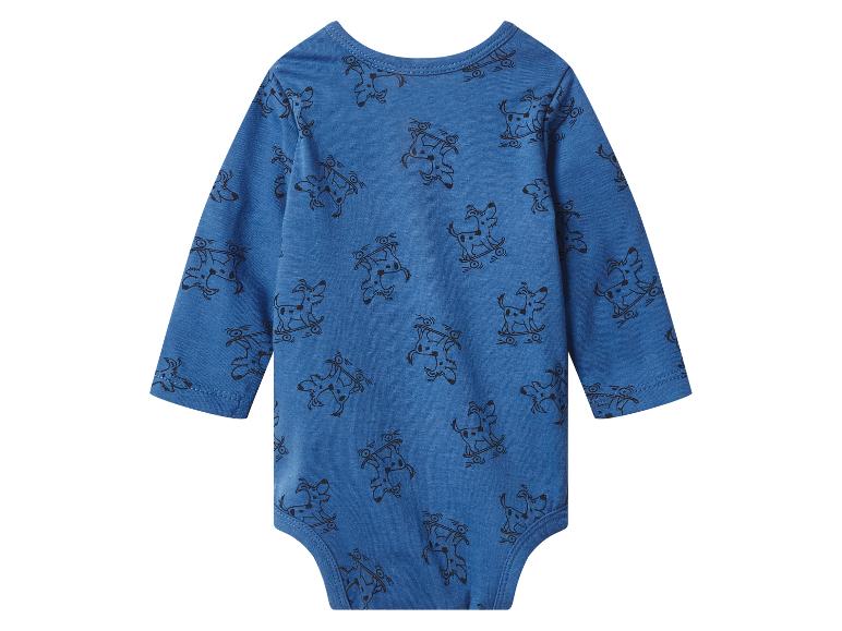 Blauwe baby romper met lange mouwen en honden op skateboards patroon