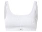 Witte dames sportbeha met geribbelde textuur en de tekst 'LOVE COTTON' op de onderband.