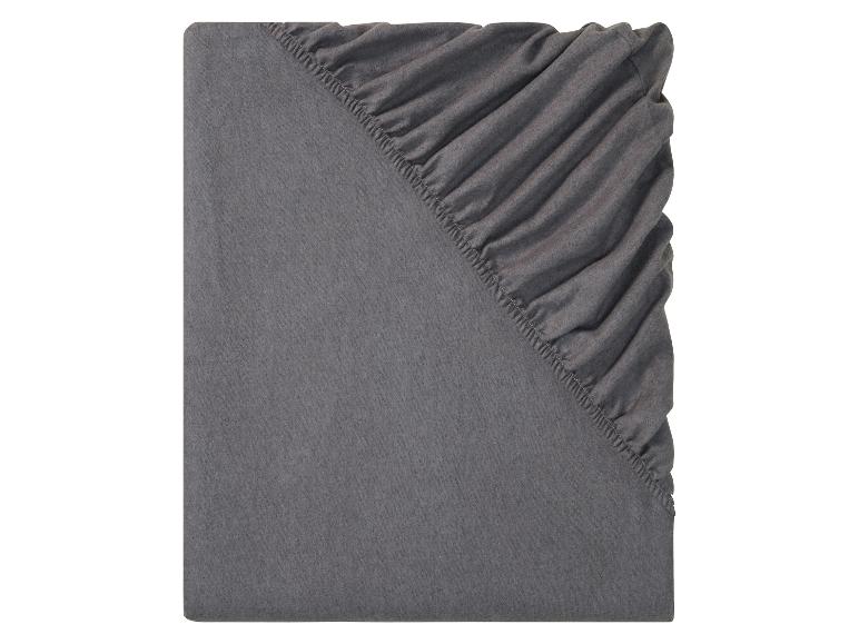 Grijs hoeslaken op een witte achtergrond