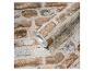 Rol baksteenbehang met textuur, in diverse tinten bruin en grijs.