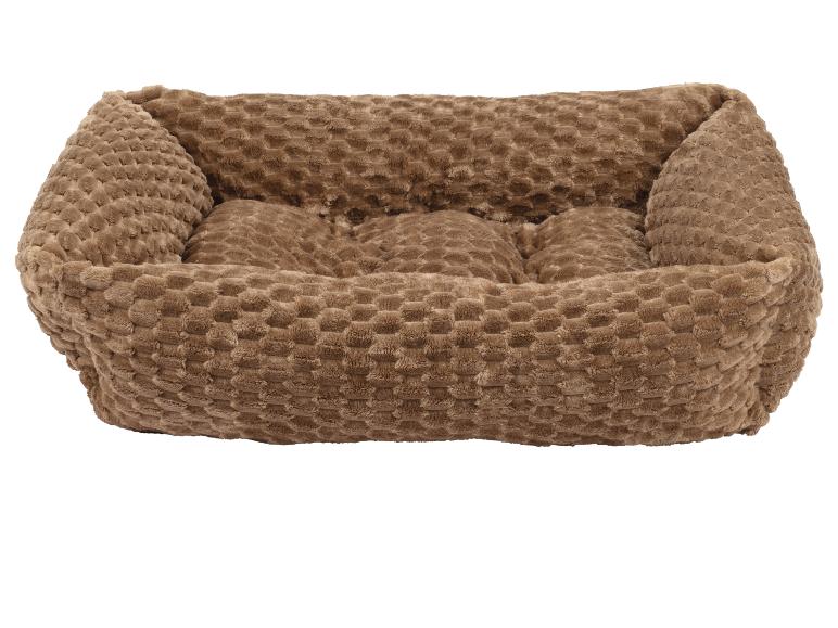 Bruin huisdierbed van zacht, getextureerd materiaal.
