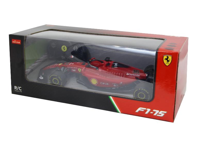 Rode Ferrari F1-75 afstandsbedienbare auto in een doorzichtige displaydoos.
