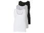 Drie basic tanktops in wit, grijs en zwart.