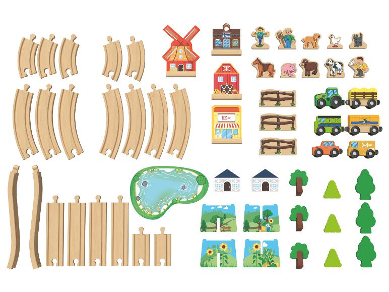 Houten speelset met boerderijthema, inclusief treinrails, voertuigen, dieren en gebouwen.