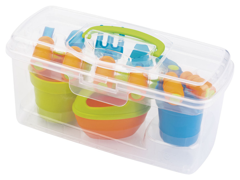 Een opbergdoos met strandspullen, inclusief emmertjes en schepjes.