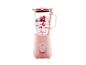 Roze blender met glazen kan gevuld met bessen en yoghurt.