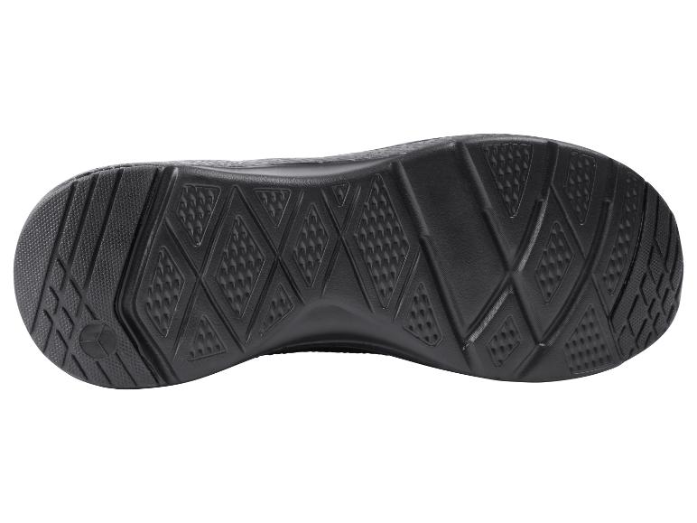 Zool van een zwarte sportschoen met textuur.