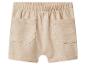 Beige sweatshorts met elastische tailleband en twee zakken.