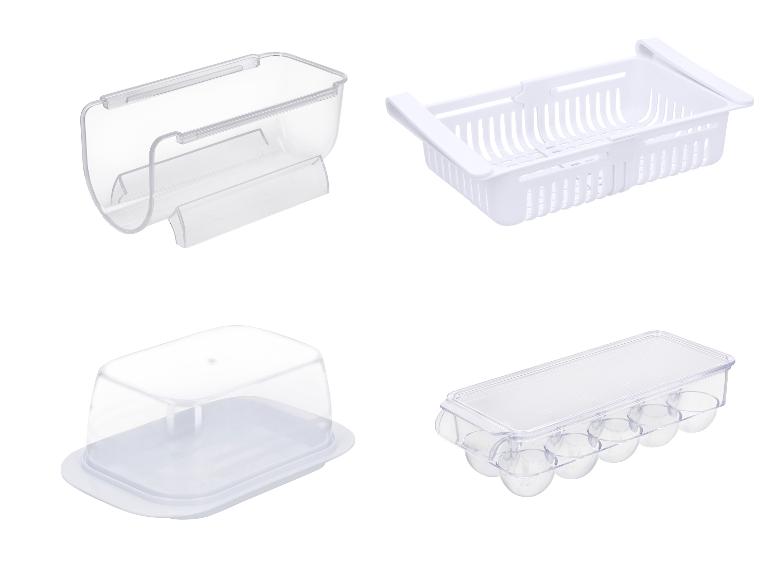 Koelkastopbergers: transparante bakjes, een botervloot en een eierhouder.