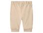 Beige babybroek met elastische tailleband en geribde boorden.
