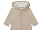 Beige baby hoodie met knopen.