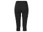Zwarte capri leggings met zijzakken.