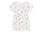 Een wit jurkje met korte mouwen en een vrolijke citroenenprint.