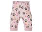 Roze baby legging met bloemen en cartoonfiguren.