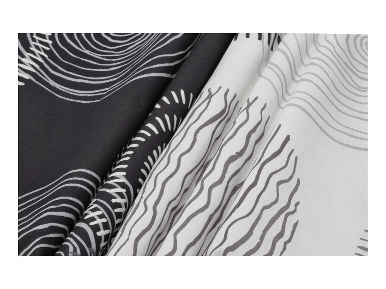 Stof met golvend gestreept patroon in zwart en wit