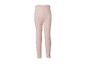 Lichtroze legging met rode stippen.