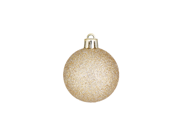 Gouden glitter kerstbal op een zwarte achtergrond.