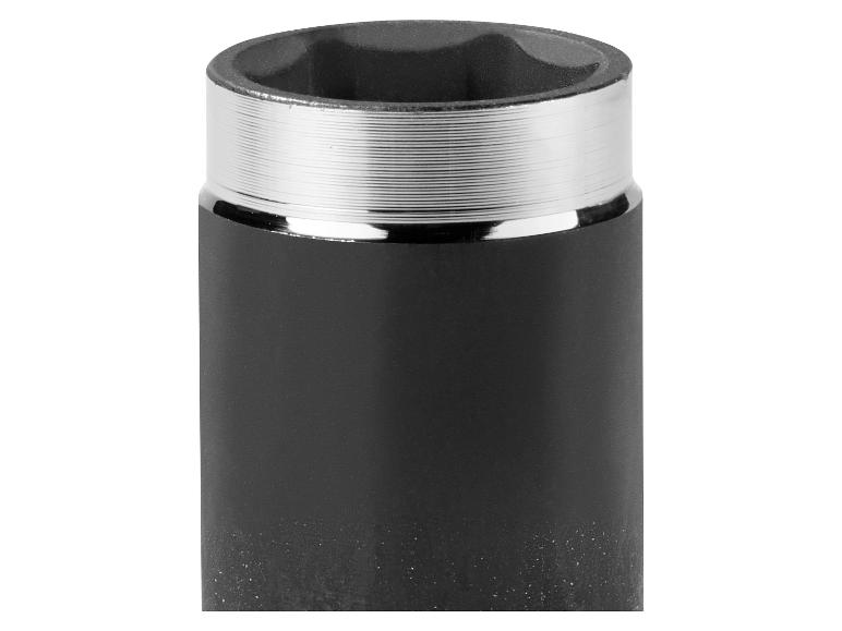 Close-up van een zwarte slagdop met een chromen ring.