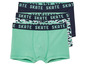 Drie groene boxershorts met 'Skate' print.