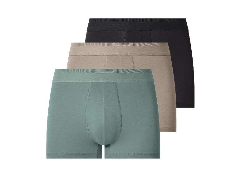 Set van drie herenboxers: zwart, beige en teal.