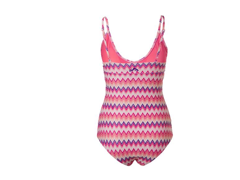 Dames badpak met roze en paars zigzagpatroon.