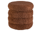 Stapel van vier ronde, bruine, getextureerde kussens of poefs.