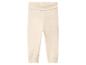 Lichtbeige babybroek met geribbelde textuur en brede tailleband