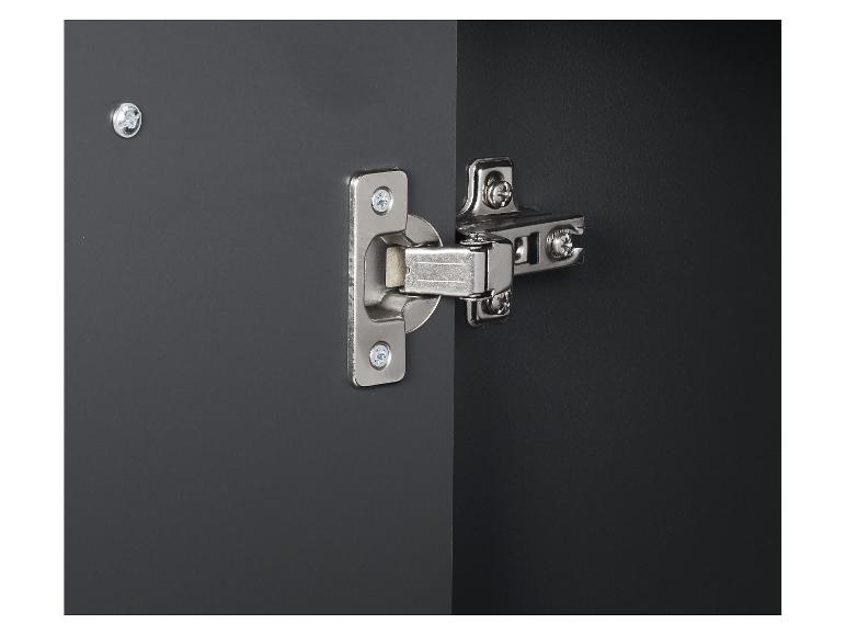 Close-up van een donkergrijze kastdeur met een zilveren scharnier.