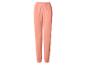 Perzikkleurige joggingbroek met elastische tailleband en boorden.