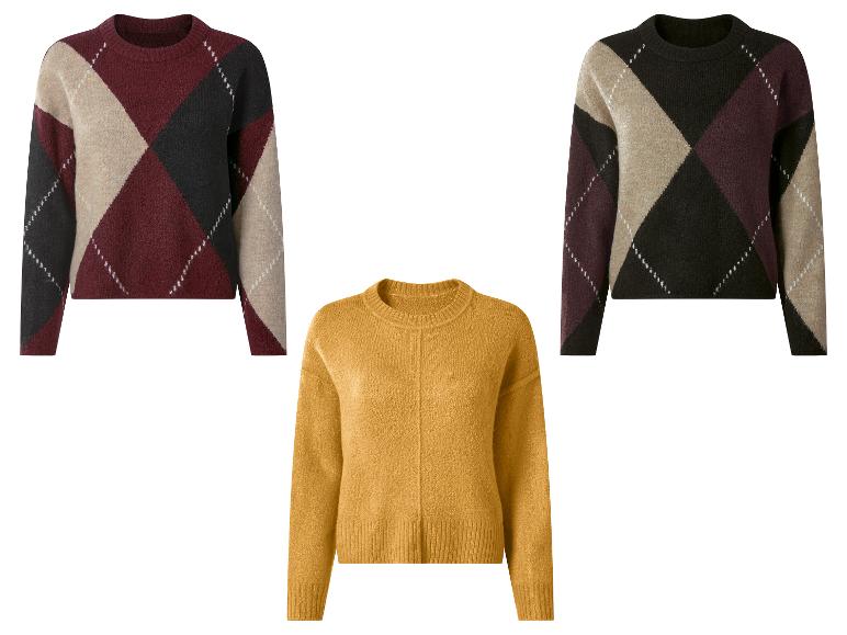 Twee argyle truien en één effen gele trui.
