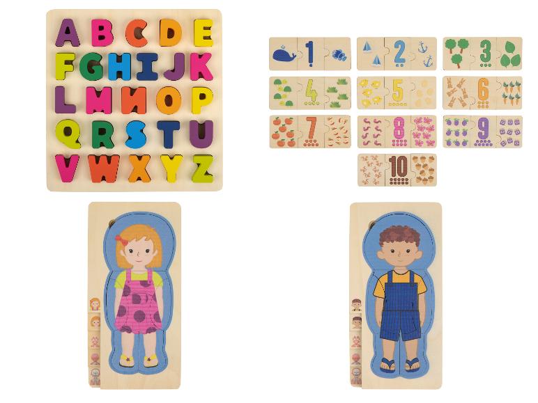 Houten puzzels met alfabetletters, cijfers en kinderfiguren.