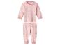 Roze babypyjama met sneeuwvlokkenpatroon