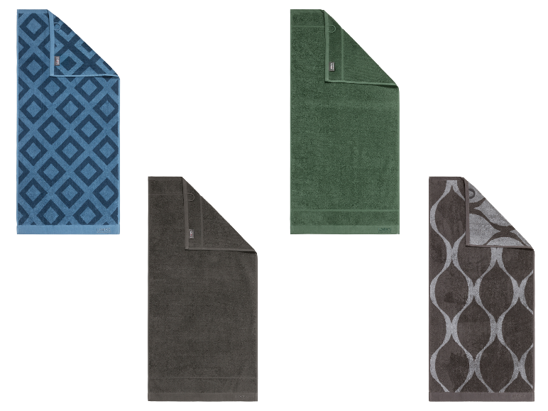 Vier LOOKS handdoeken in verschillende kleuren en patronen.