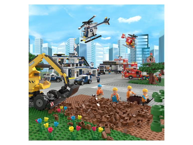 Lego stadsspeelset met politie, brandweer en bouwplaats.