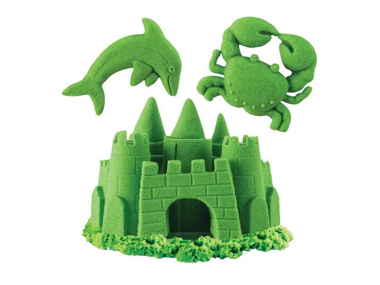 Groen kinetisch zandkasteel met een dolfijn en krab.