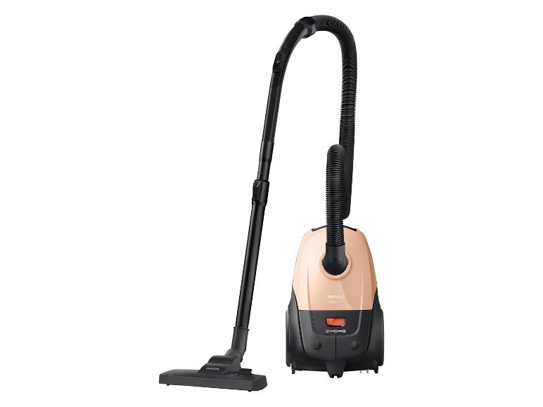 Beige stofzuiger met zwarte slang en mondstuk op witte achtergrond.