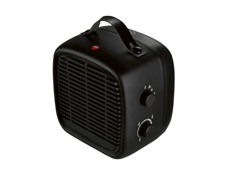 Zwarte draagbare elektrische kachel met handvat en bedieningsknoppen.