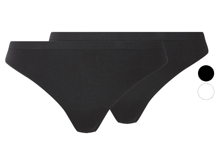 Twee paar zwarte damesonderbroeken, één iets achter de andere