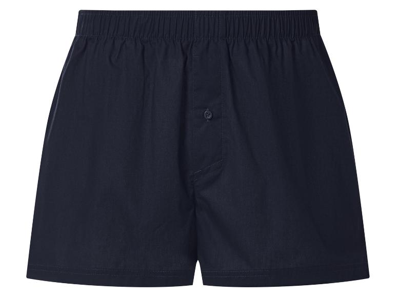 Donkerblauwe herenboxershort met elastische tailleband en knoopsluiting.