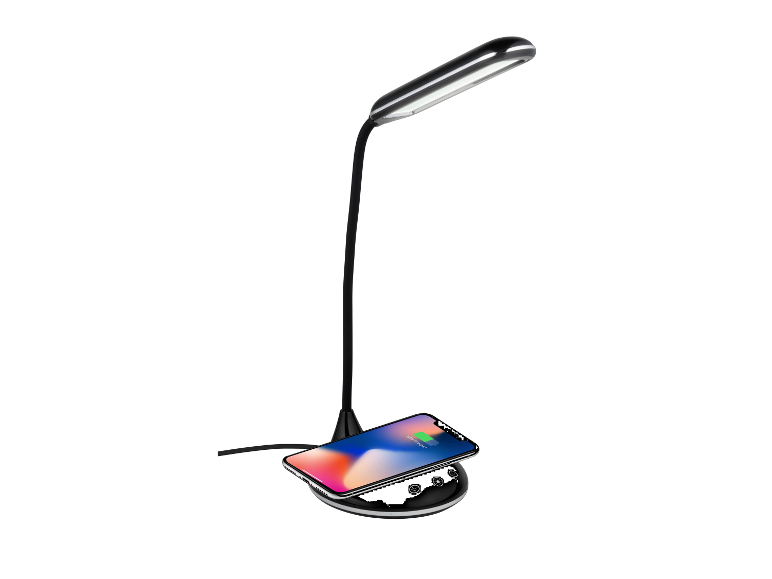 Moderne bureaulamp met draadloze telefoonoplader.