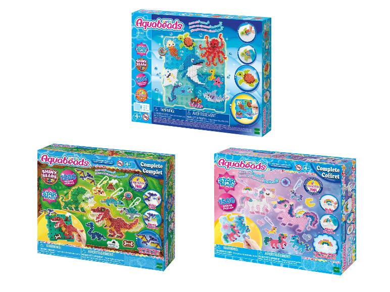 Drie waterparelsets met zee-, dinosaurus- en eenhoornthema's.
