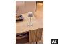 LIVARNO® LED-accu-tafellamp op een houten tafel met een geurverspreider. [AI-gegenereerde afbeelding]