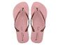 Roze teenslippers met metallic bruine bandjes en palmboomdetails.