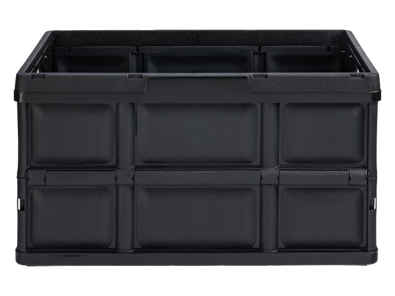 Zwarte opvouwbare plastic opbergkist.
